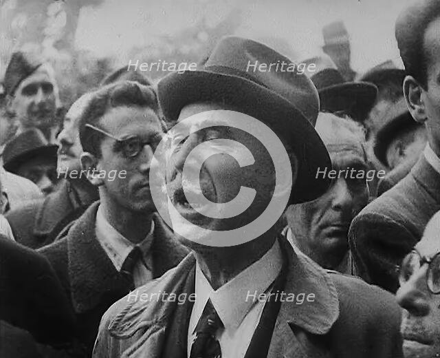 Italian Civilians Listening to a Speech About Removing the Monarchy, 1943-1944. Creator: British Pathe Ltd.