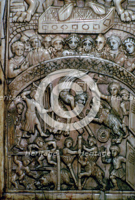 Detail of a leaf of a Byzantine ivory diptych showing men and bears at the circus.
