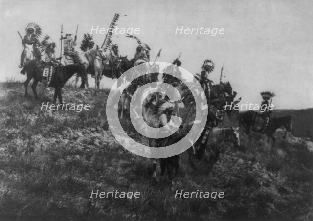 Oglala war party, c1907. Creator: Edward Sheriff Curtis.