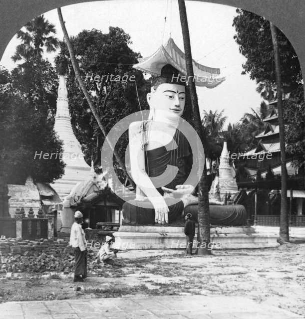 Buddha statue, Shwedagon Pagoda, Rangoon, Burma, 1908. Artist: Stereo Travel Co