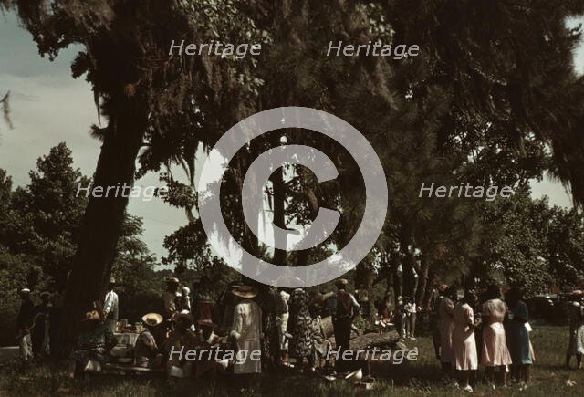 A Fourth of July celebration by a group of Negroes, St. Helena Island, S.C., 1939. Creator: Marion Post Wolcott.