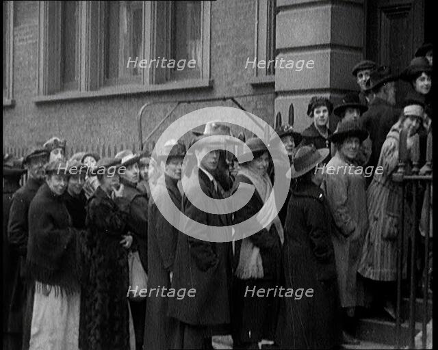 A Crowd of People Waiting an Unemployment Queue, 1924. Creator: British Pathe Ltd.