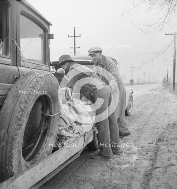 En-route to pea harvest in Imperial Valley, U.S. 99, Tulare, California, 1939. Creator: Dorothea Lange.