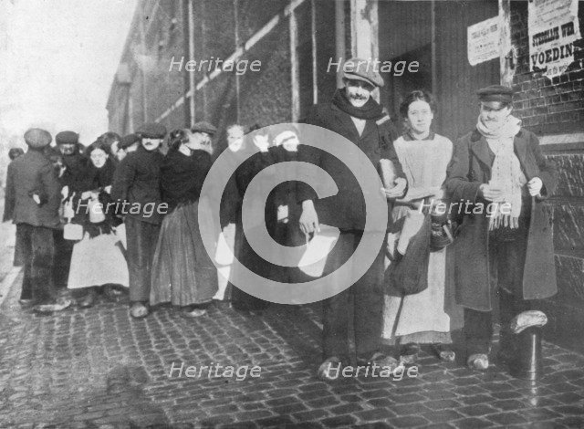 'Waiting for relief rations at Bruges', 1915. Artist: Unknown.