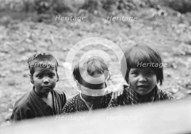 Three Ainu children, 1908. Creator: Arnold Genthe.