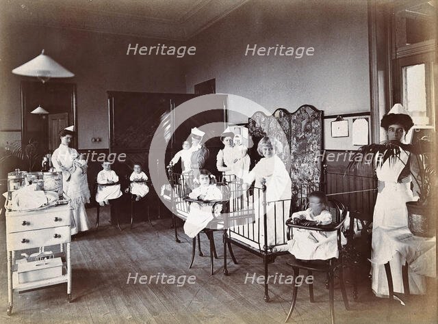 Johannesburg Hospital, South Africa: small hospital ward with nurses and children, c1905. Creator: Unknown.