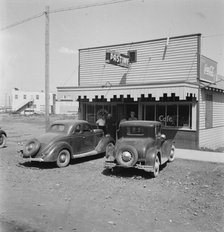 Pastime Cafe on main street of small potato town, Tulelake, Siskiyou County, California, 1939. Creator: Dorothea Lange.