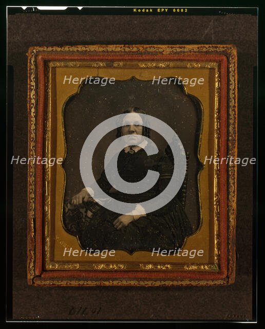 Unidentified woman, three-quarters length portrait, seated in chair with right arm..., ca. 1855. Creator: Francis Grice.