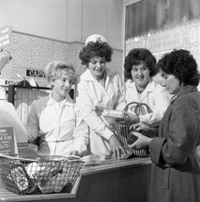 Checkout girls at a supermarket opening, Brough's Ltd, Thurnscoe, South Yorkshire, 1963. Artist: Michael Walters