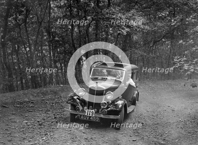 Standard competing in the B&HMC Brighton-Beer Trial, Fingle Bridge Hill, Devon, 1934. Artist: Bill Brunell.