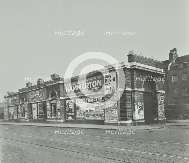 Islington Tramways Sub-Station and advertisements, London, 1936. Artist: Unknown.