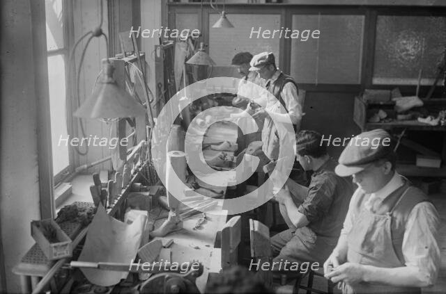 Cripples making artificial limbs, between c1915 and c1920. Creator: Bain News Service.