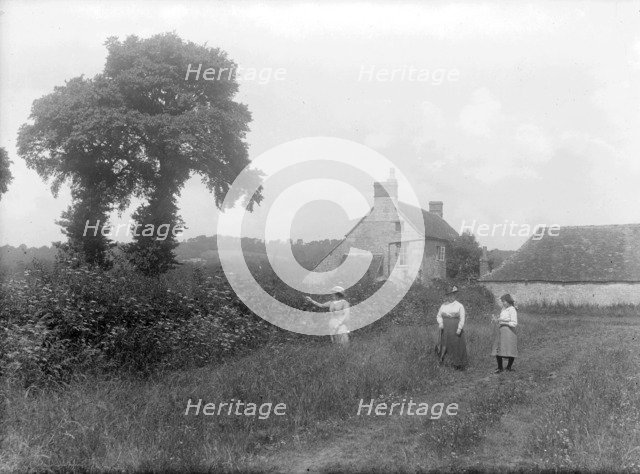 Three women walk through the countryside near Brasenose Farm, Oxford, Oxfordshire, c1860-c1922. Artist: Henry Taunt