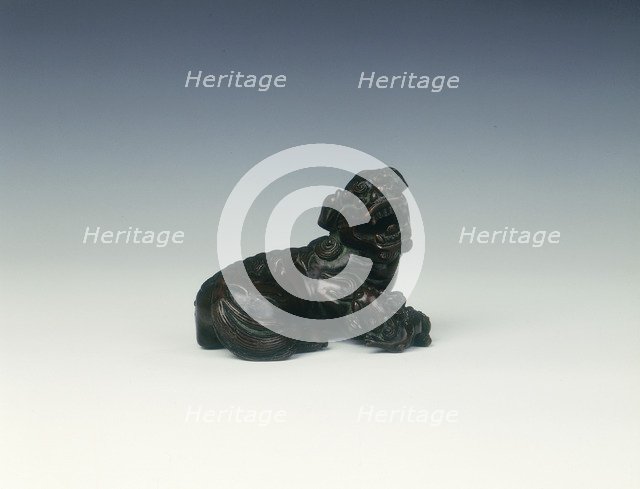 Brass Buddhist lion dog with offspring, late Ming to early Qing dynasty, China, 17th century. Artist: Unknown