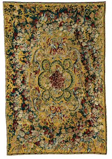 Table Carpet with Garlands of Flowers and Rinceaux, Flanders, 1650/75. Creator: Manufacture royale d'Aubusson.