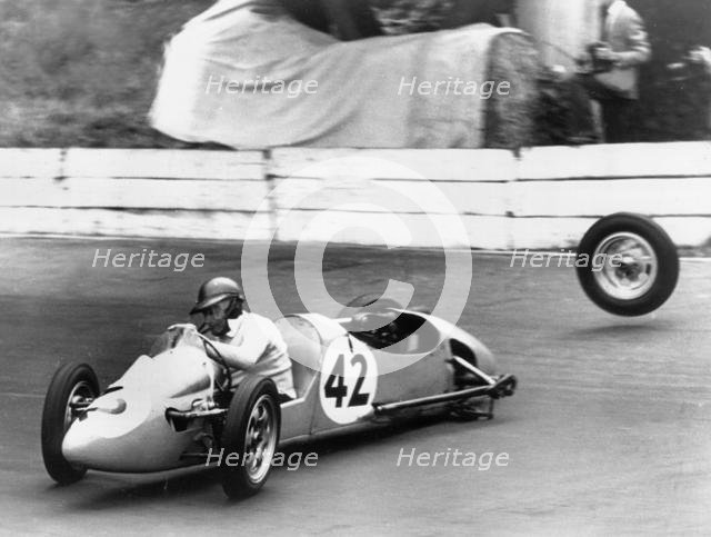 1954 Kieft 500cc at Crystal Palace, losing a wheel. Creator: Unknown.