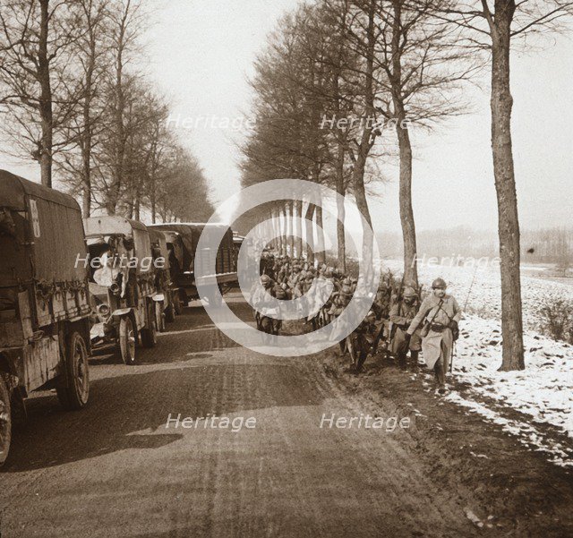Column of trucks and troops, Somme-Tourbe, northern France, c1914-c1918. Artist: Unknown.