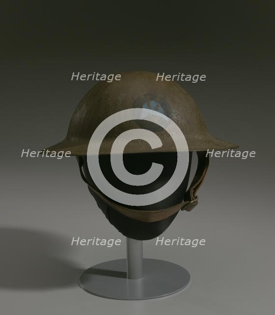 Combat helmet from World War I used by the 93rd Infantry Division, 1914-1918. Creator: Unknown.