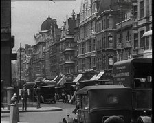 Cars Driving Through London, 1936. Creator: British Pathe Ltd.