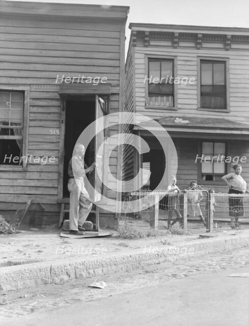 Twelve dollars a month for three rooms, Housing, Richmond, Virginia. , 1938. Creator: Dorothea Lange.