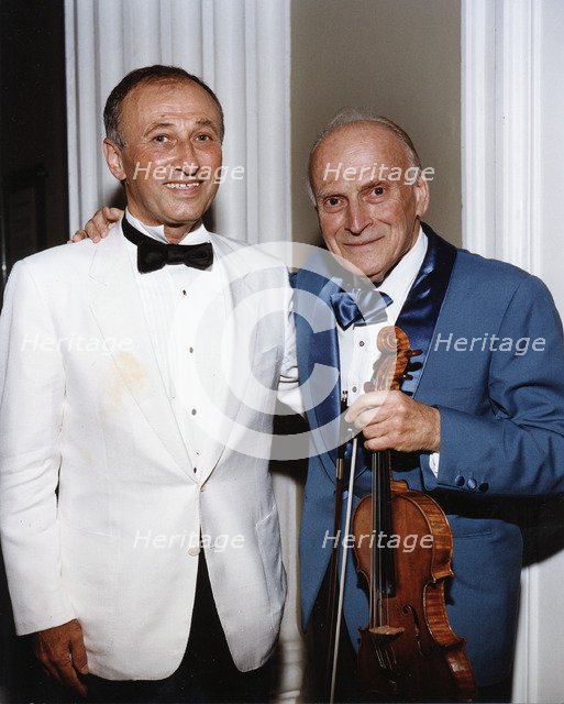 Yehudi Menuhin, American violinist, and Dov Seltzer, Romanian composer, 1992. Artist: Sidney Harris