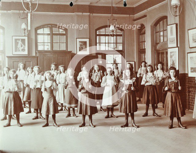Girls holding Indian clubs, Cromer Street School/ Argyle School, St Pancras, London, 1906. Artist: Unknown.