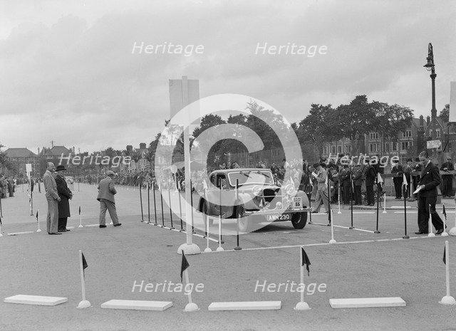 Riley Kestrel of A Bassett competing in the South Wales Auto Club Welsh Rally, 1937 Artist: Bill Brunell.