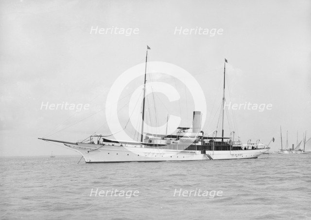 The steam yacht 'Surf' at anchor, 1912. Creator: Kirk & Sons of Cowes.