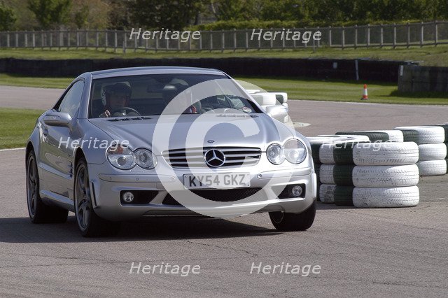 2004 Mercedes Benz 600 SLV12 Artist: Unknown.