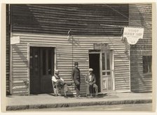 Sidewalk Portrait of Three Men, Vicksburg, Mississippi, 1936. Creator: Walker Evans.