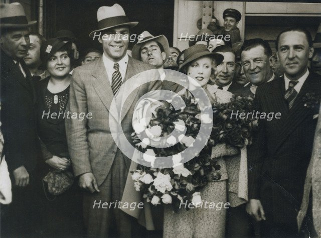 Max Schmeling and Anny Ondra arrive in Barcelona, Spain, 1933. Artist: Unknown