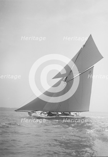 The cutter 'Rosamond' sailing close-hauled, 1911. Creator: Kirk & Sons of Cowes.