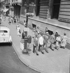 Traffic on Fifth Avenue approaching 57th Street on a summer afternoon, New York City, 1939 Creator: Dorothea Lange.