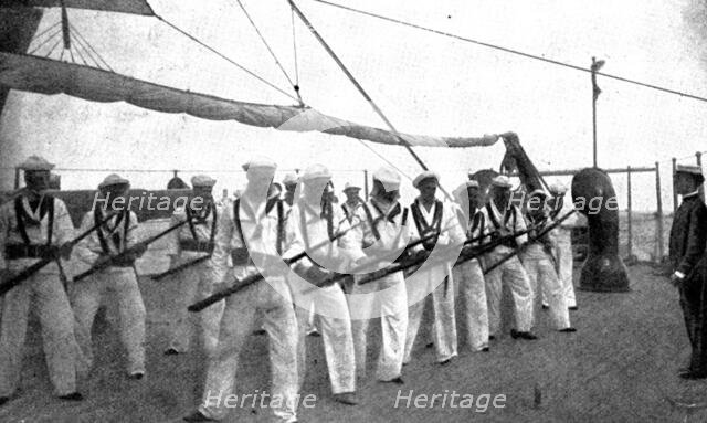 The Spanish-American War: American naval and military types - rifle drill: "Guard!", 1898. Creator: Unknown.