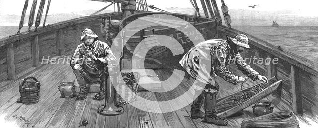 'Long-line fishing in the North Sea, on deck baiting the lines', 1886.  Creator: Unknown.
