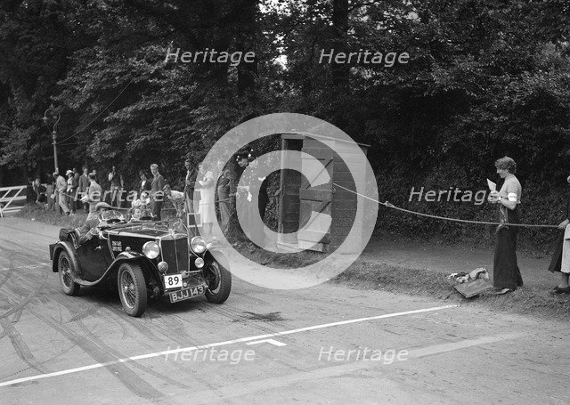 AL Baker's MG Magnette, winner of a bronze award at the MCC Torquay Rally, July 1937. Artist: Bill Brunell.