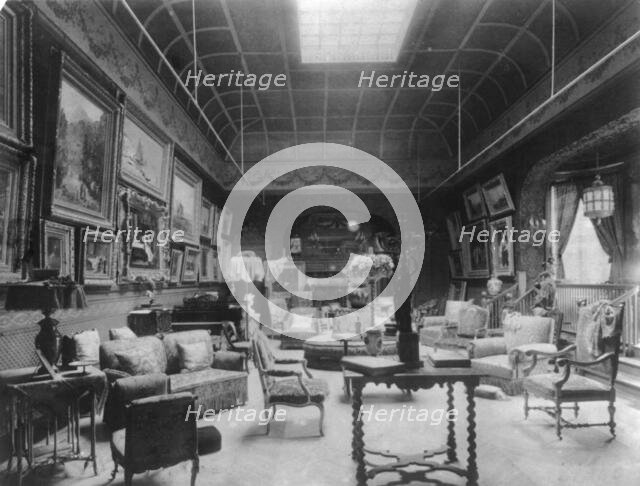 Large parlor of the William C. Whitney house, Washington, D.C., with many paintings on..., 1890s. Creator: Frances Benjamin Johnston.