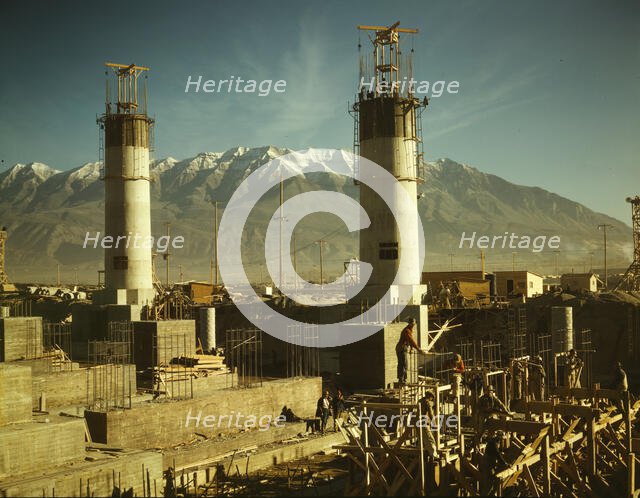 Partly finished open hearth furnaces and stacks for a..., Columbia Steel Co., Geneva, Utah, 1942. Creator: Andreas Feininger.