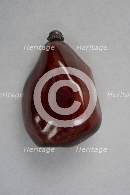 Amber snuff bottle of natural pebble form, China, Qing dynasty, 1644-1911. Creator: Unknown.