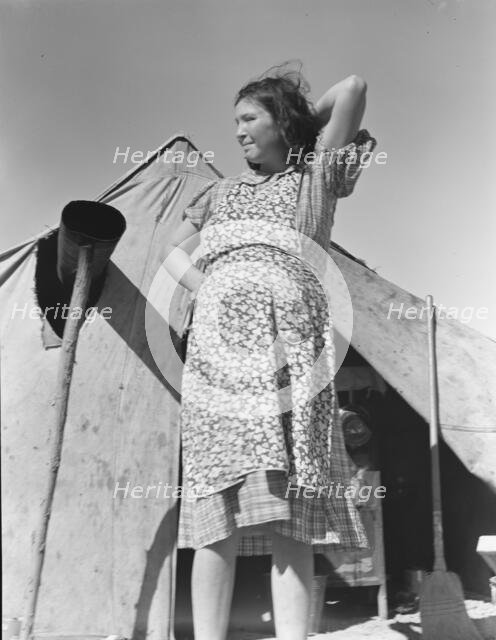 Grower's camp for migrant labor on the edge of the pea fields, near Calipatria, CA, 1939. Creator: Dorothea Lange.