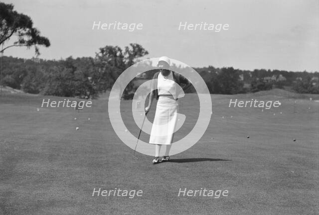 Cassidy, Ellen, Mrs., on golfcourse, 1932 July. Creator: Arnold Genthe.