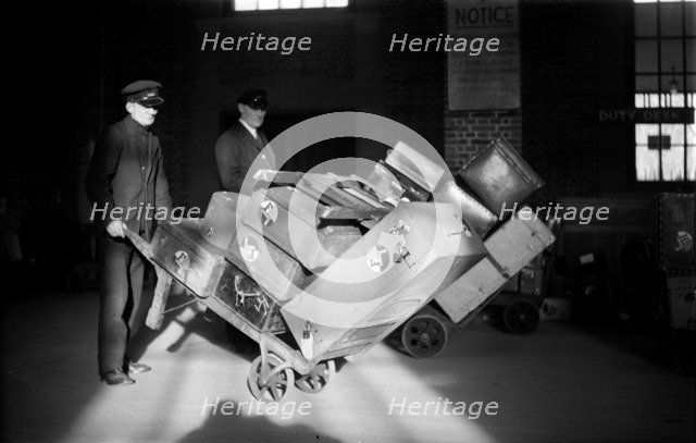 Two porters at Tilbury Passenger Landing Stage, Essex, c1945-c1965. Artist: SW Rawlings