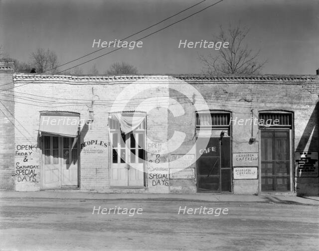Main street storefronts, Edwards, Mississippi, 1936.  Creator: Walker Evans.