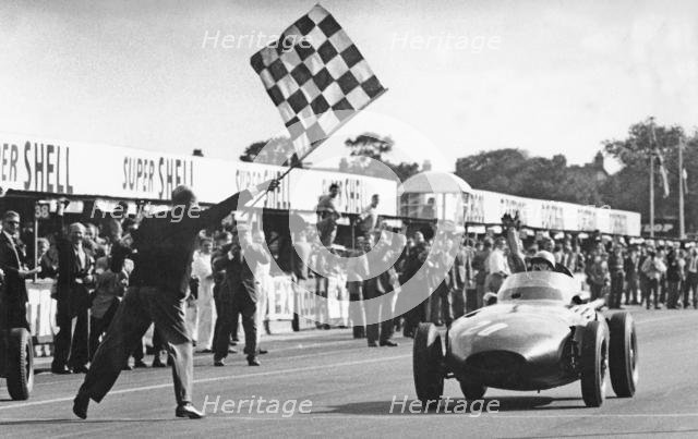 Stirling Moss winning 1957 British Grand Prix at Aintree in the Vanwall. Creator: Unknown.