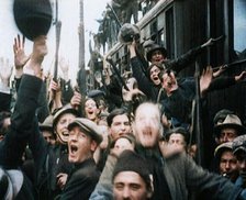 Italian Soldiers Standing on or Near a Train, Waving and Cheering, 1922. Creator: British Pathe Ltd.