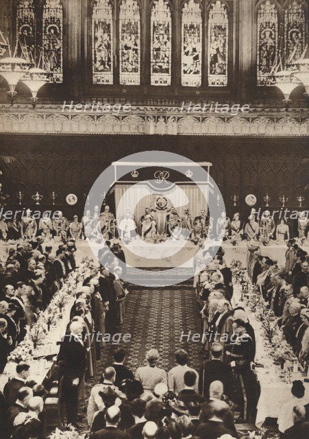 'King George VI and Queen Elizabeth attending a luncheon to celebrate coronation', 1937. Artist: Unknown.