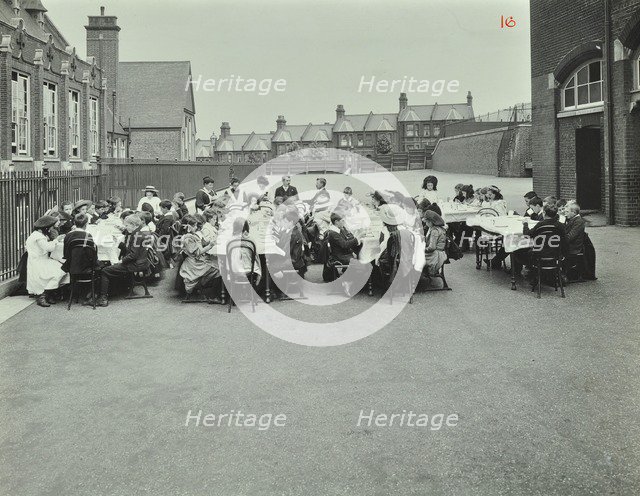 Children eating dinner at tables in the playground, Shrewsbury House Open Air School, London, 1908. Artist: Unknown.
