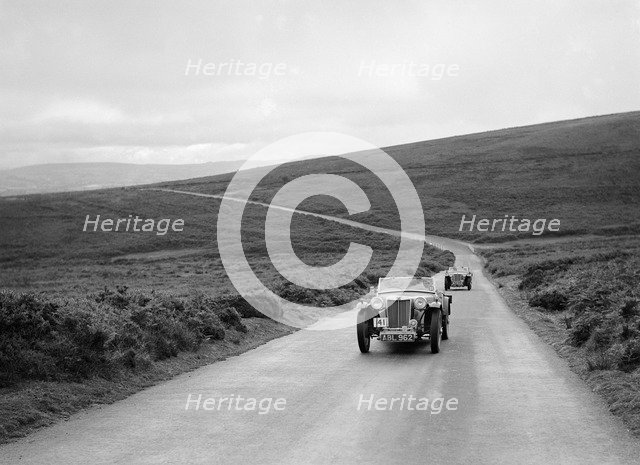 MG TAs of HK Crawford and JES Jones competing at the MCC Torquay Rally, July 1937. Artist: Bill Brunell.