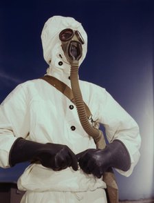 Sailor at the Naval Air Base wears the new type protective clothing...Corpus Christi, Texas, 1942. Creator: Howard Hollem.