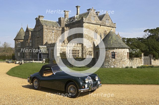 1954 Jaguar XK140 outside Palace House, Beaulieu Artist: Unknown.